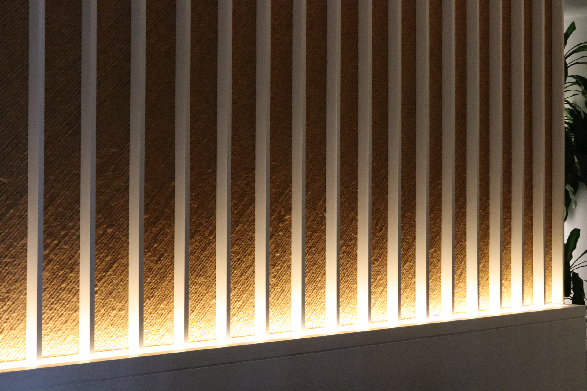 Warm architectural detail of the wall inside a Cornerstone event space